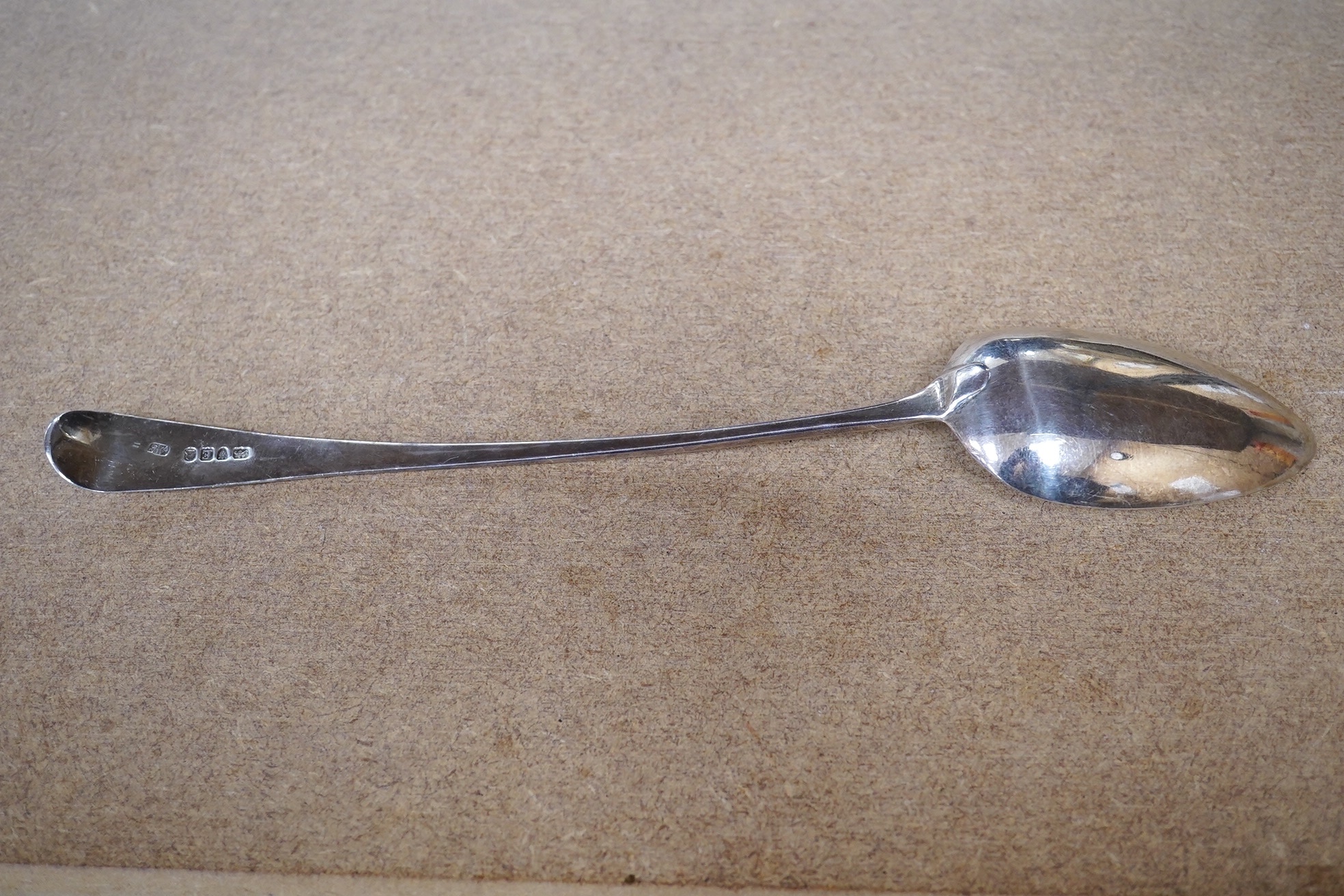 A George III silver Old English pattern basting spoon, London, 1800, 30.6cm, 86 grams. Condition - fair